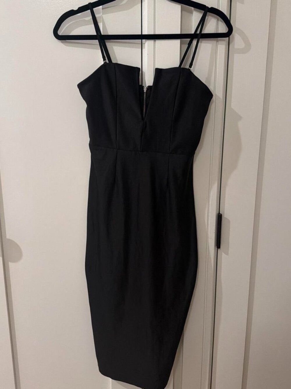 Black bodycon dress with deep v zipper back